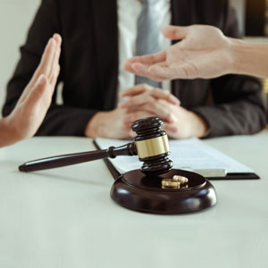 Frustrated couple in a legal consultation discussing high-conflict divorce strategies in Texas